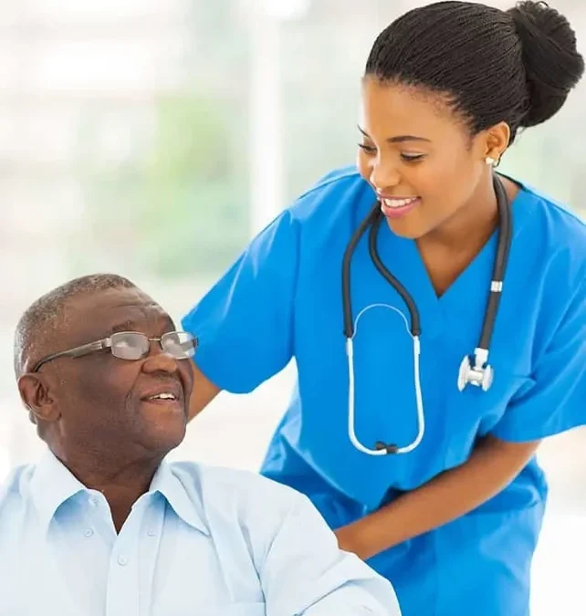palliative-nurse-helping-elderly-man